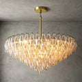 Illuminated Modern Cascading Amber Faceted Art Glass Chandelier Studio Shot