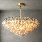 Illuminated Modern Cascading Amber Faceted Art Glass Chandelier Studio Shot