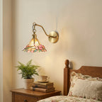 Modern Brass and Glass Butterfly Wall Sconce in Guest Bedroom