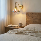 Modern Brass Butterfly Stained Glass Wall Sconce in Master Bedroom
