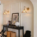 Traditional Brass Butterfly Wall Sconce Over Entryway Table