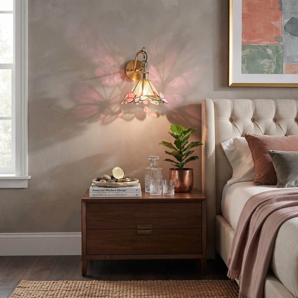 Modern Pink Butterfly Stained Glass Wall Sconce in Bedroom Setting