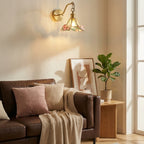 Modern Brass Butterfly Wall Sconce in Living Room Corner