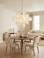 Modern Round Disc Chandelier in Living Room Interior