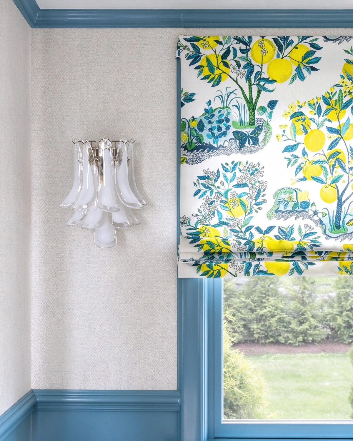 Modern Silver Frame Feather Art Glass Wall Sconce in Bright Living Area