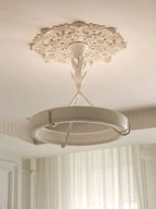Modern White Ring Chandelier with Detailed Ceiling Medallion