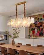 Modern Brass Double-Tier Oval Wave Chandelier in Stylish Dining Room