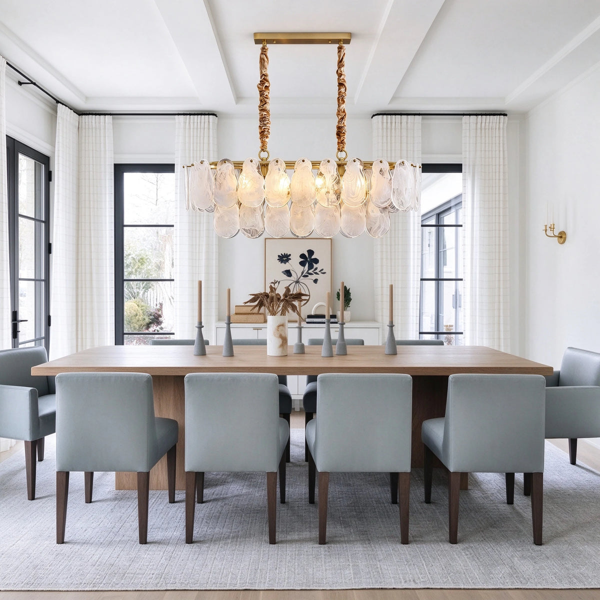 Modern Brass Double-Tier Oval Wave Chandelier in Formal Dining Setting
