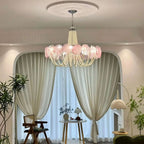 Front View of Pink Glass Disc Chandelier on Pure White Background