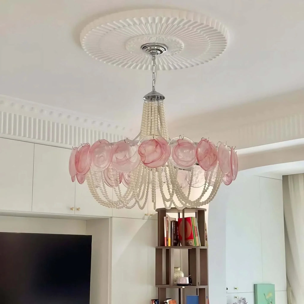  Illuminated Pink Glass Chandelier in Warm Ambient Light