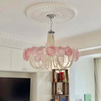 Illuminated Pink Glass Chandelier in Warm Ambient Light