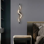 Modern Wave LED Wall Light Mounted in Contemporary Bedroom